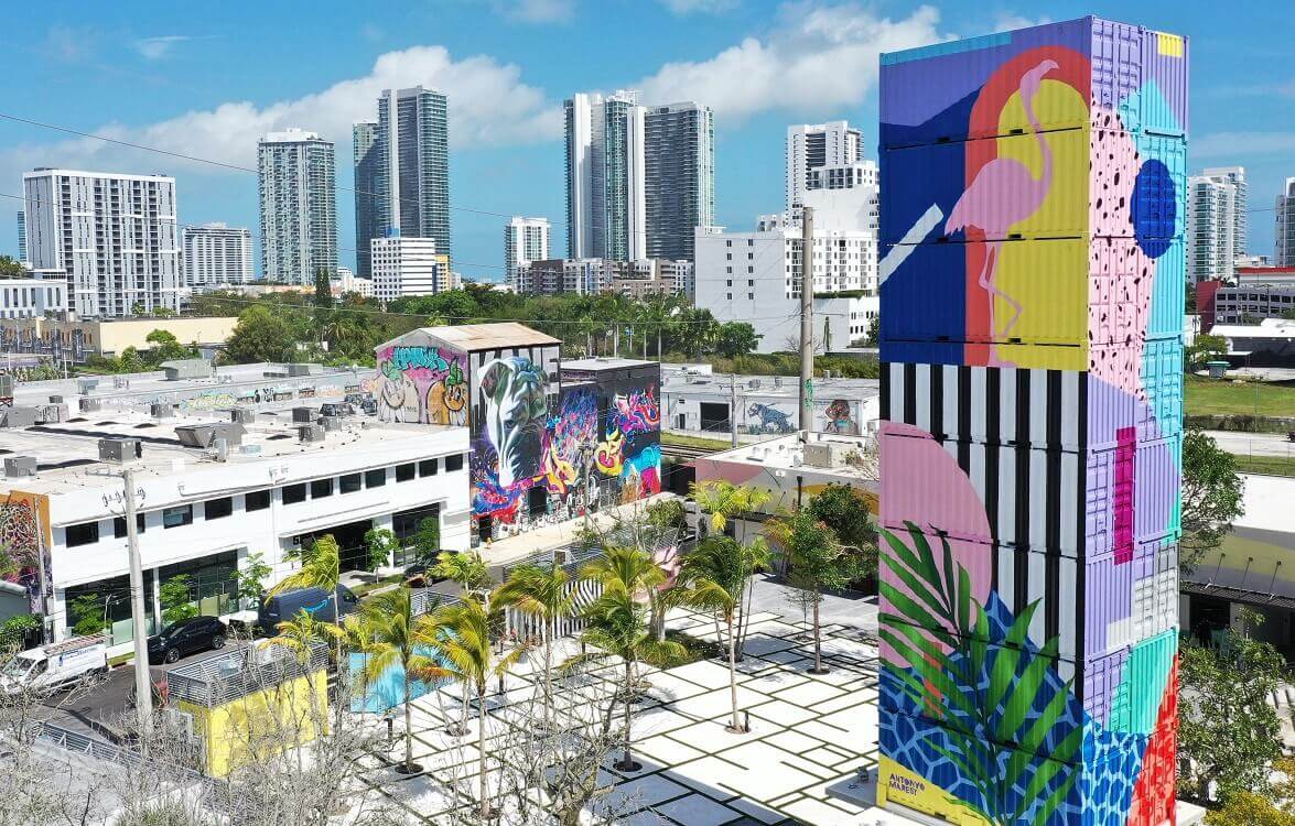 Wynwood is a Miami neighborhood with the vibrant street art scene, trendy restaurants and bars, and lively nightlife